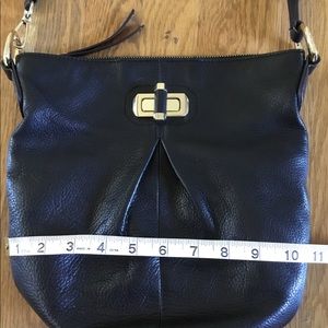 B. Makowski leather crossbody purse